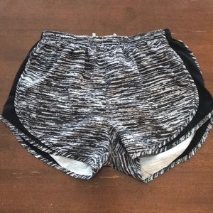 Medium Nike dry fit running shorts.